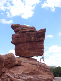 Fred holds up Balanced Rock
